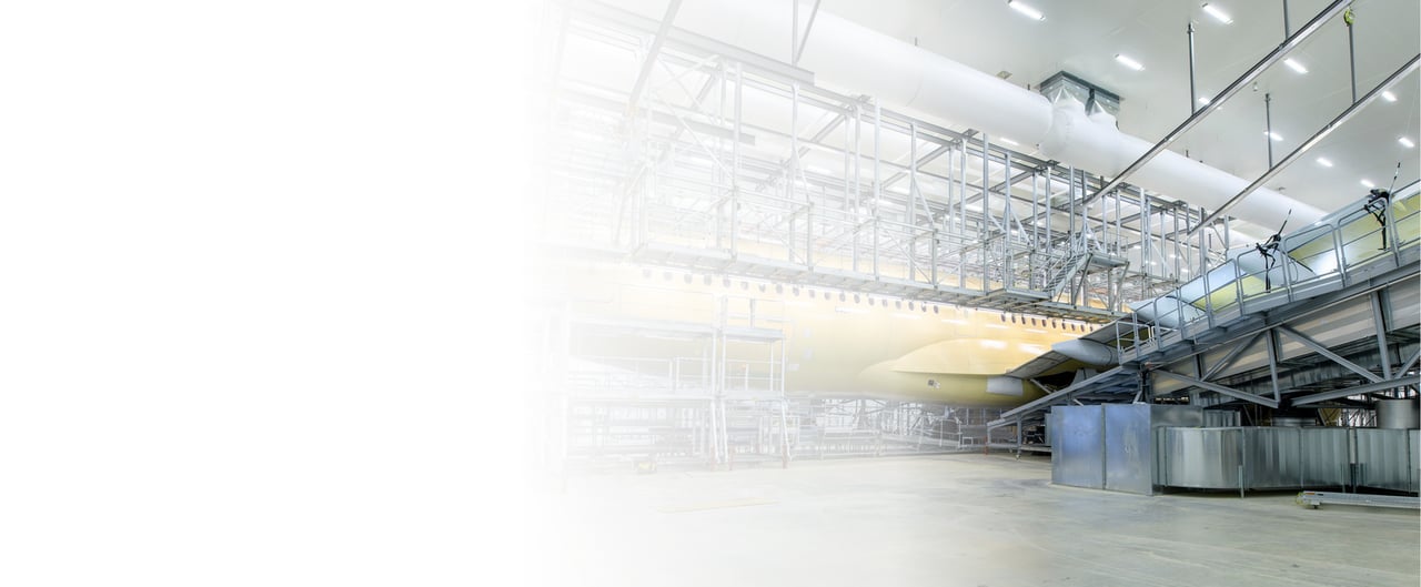 Factory hall with an overhead gantry above the production line