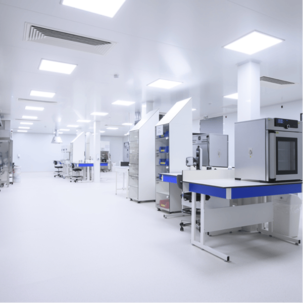 Laboratory cleanroom with workbenches, extraction hoods and equipment cabinets