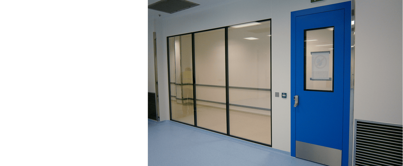 Cleanroom with a glazed partition beside a blue door