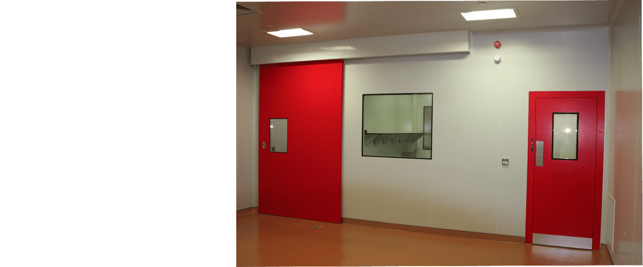 Room with a red sliding door, a glazed window and a red swing door